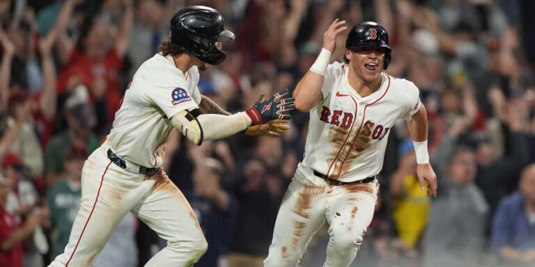 noticia-mlb-Medias-Rojas-logran-triunfo-crucial-en-la-lucha-po